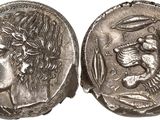 a silver coin with an image of a man and a woman on it