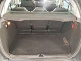 a trunk of a car with the back seats folded down
