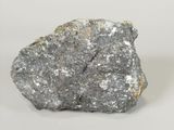 a close up of a rock on a table with a white background