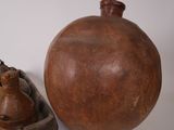 two vases sitting next to each other on a table