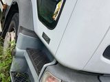 a truck that is parked on the side of the road