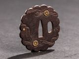 a small metal object that is sitting on a table