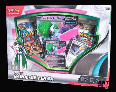 une photo d'une boîte contenant des cartes Pokémon