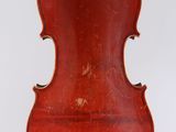 an old violin is hanging from a string on a white background