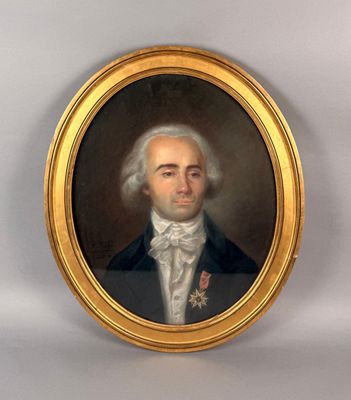 portrait d'un homme en costume-cravate dans un cadre doré