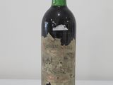 a bottle of wine that is sitting on a table