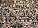 an image of a large oriental rug on the floor in a living room