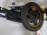 a close up of a motorcycle with a tire on the ground