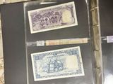 two different types of paper money in a binder