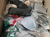 a box full of clothes and other items that are in it