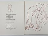 an open book with a drawing of a woman on it