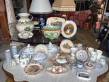 a table that has a lot of plates and cups on it