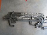 four wrenches that are sitting on the floor