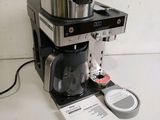 an image of a coffee maker on a table