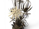 a vase with a bunch of flowers in it on a white surface