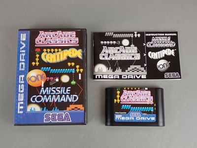 an image of a couple of video games sitting on top of a table