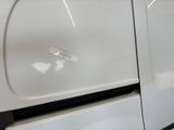 a close up of a refrigerator with a sticker on it