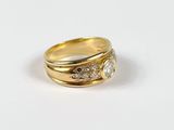 an image of a gold ring with diamonds on it