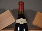 a bottle of wine that is sitting on a table