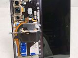 a picture of a cell phone with a broken screen