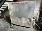 an industrial fridge sitting in the middle of a room