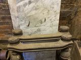 a marble block sitting on top of a wooden table