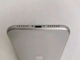 the back view of a silver iphone with a camera on top of it