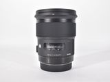 a close up of a camera lens on a white surface