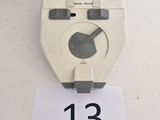 a clock that is on a table with a number 13 on it