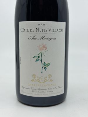 a bottle of wine that is sitting on a table