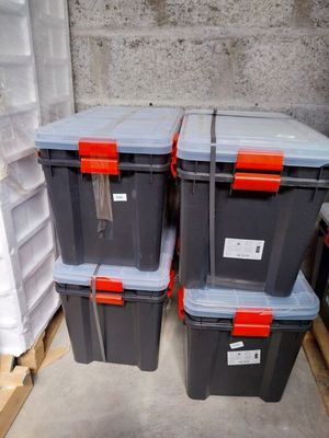 three plastic storage boxes stacked on top of each other