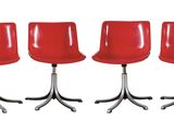 six red chairs sitting on top of each other in a row