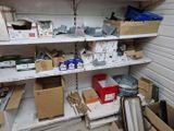 many boxes and boxes on the shelves in the room