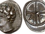 a close up of a coin with a lion on it
