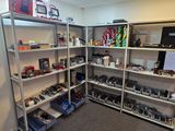 a room with a lot of toys on the shelves