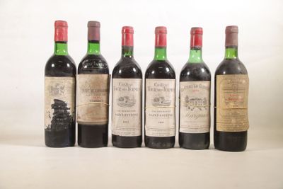 six bouteilles de vin sont alignées sur une table