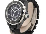 a black watch with a black face on a white background