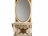 une photo d'une commode blanche et dorée avec un miroir