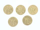 quatre pièces d'or sur lesquelles figurent Jésus et d'autres personnages religieux