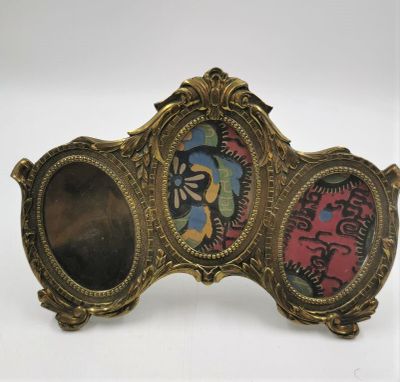 Un cadre à 3 porte-photos - laiton