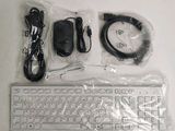 a picture of a computer keyboard and mouse in a bag