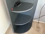 a tv that is sitting on top of a shelf