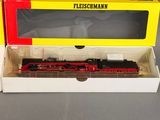 an image of a red and yellow box with a train in it