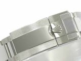a close up of a wrist with a watch on it