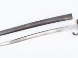 an old knife and a small knife on a white surface