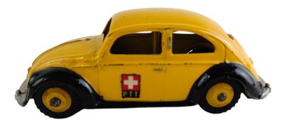 petite voiture jouet jaune avec une croix rouge sur le côté