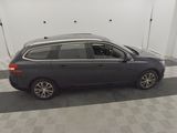 the car is parked in the garage with the door open