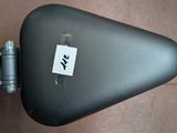 a close up of a black case with a sticker on it