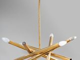 a close up of a gold chandelier with white lights