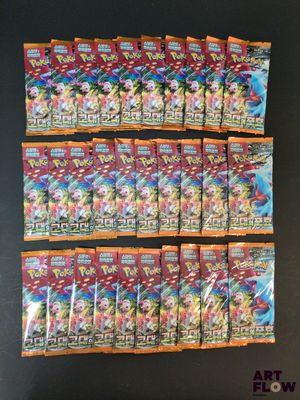 gros plan d'un paquet de cartes pokemon sur une table